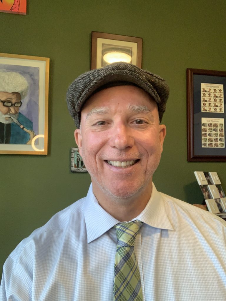 Dan Hanley wearing a cap