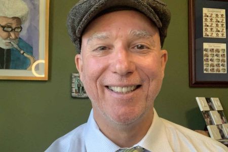 Dan Hanley wearing a cap