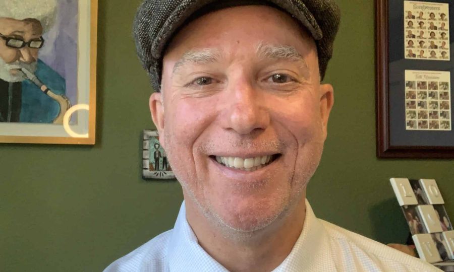 Dan Hanley wearing a cap